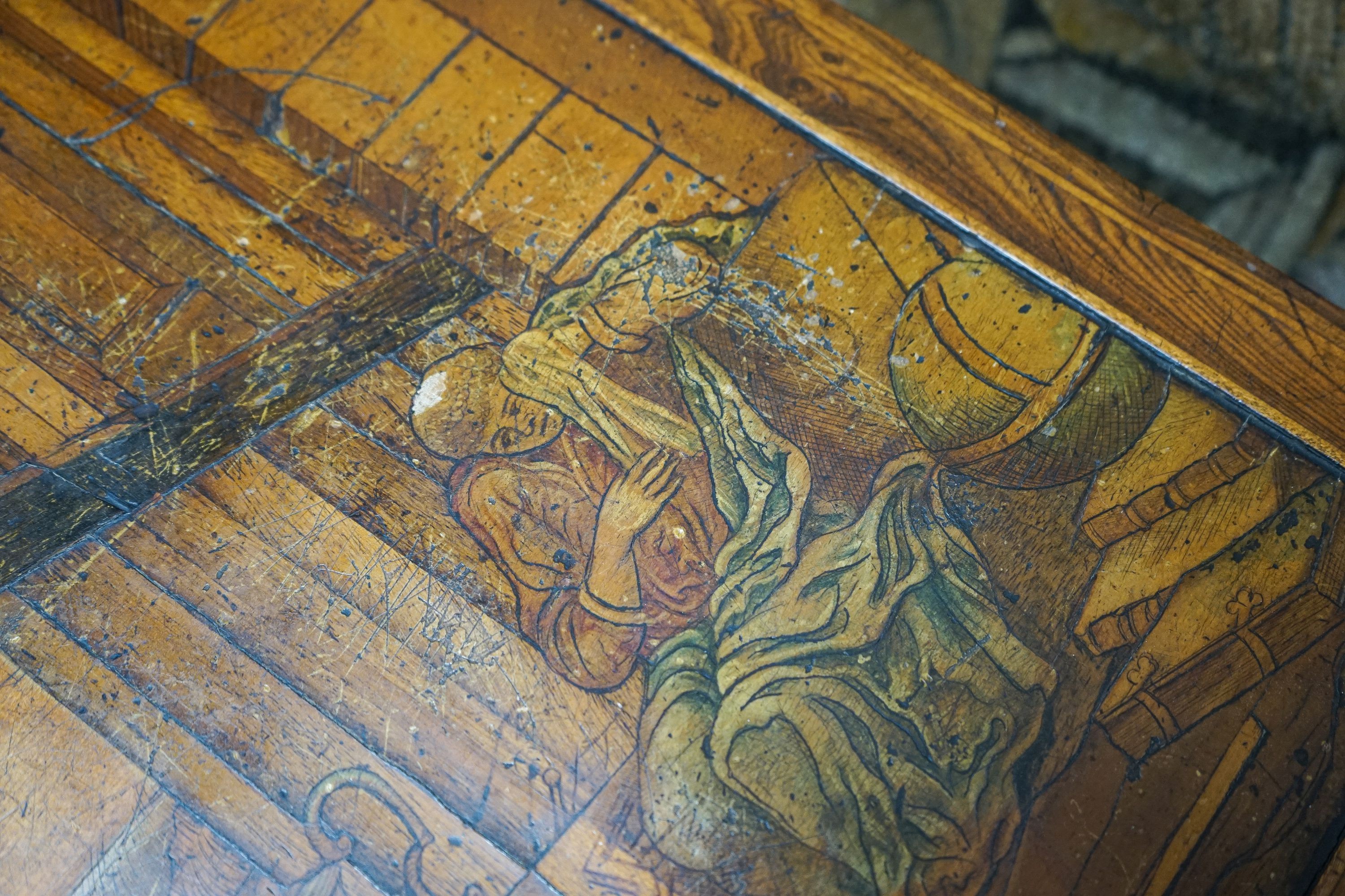 A 19th century Continental walnut side table, the top with penwork decoration and a tinted scene of figures among Roman ruins, width 41cm, depth 50cm, height 69cm